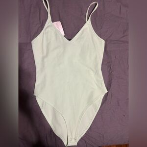 3 size small body suits